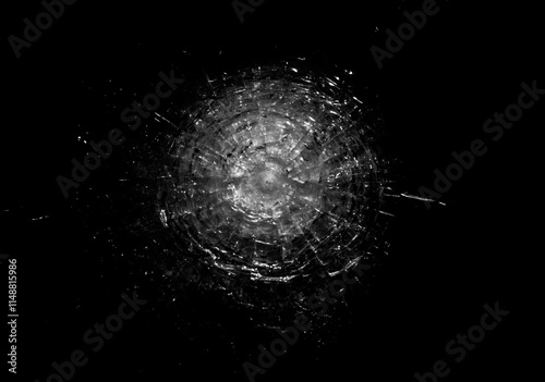 Broken glass on black background photo