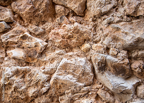 Background photography of grunge wall of old house in Mallorca, Spain, fence; cement; concrete; abstract pattern; textured; terracotta