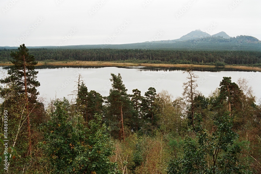 Fototapeta premium Brehynsky rybnik and Bezdez in Czechia on 7. October 2024 on color film - blurriness and noise of scanned 35mm film were intentionally left in image