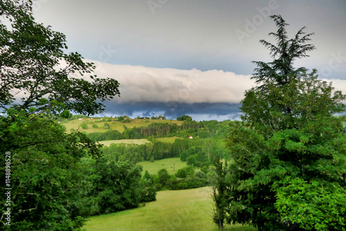 Stormy Skies over a Dodogne valley in France photo