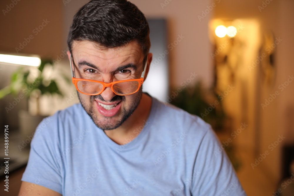 Fototapeta premium Man trying to see through dirty eyeglasses 