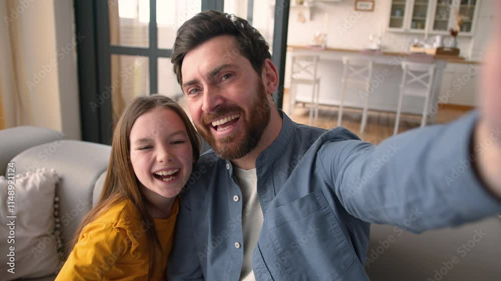 Carefree Caucasian father dad glad male daddy man making selfie photo on mobile phone camera daughter girl little child kid smiling laugh filming video blog photography for social media family at home