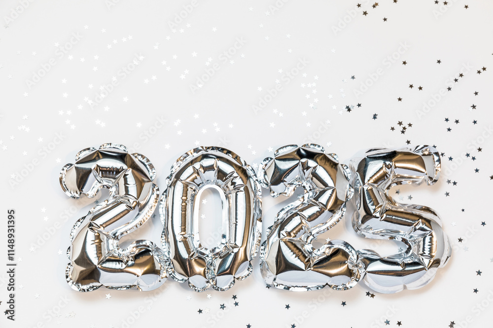New year 2025 balloon celebration card. Silver foil helium balloon number 2025, party decoration, confetti stars on white background. Copy space, flat lay, merry christmas, happy holidays concept. New year 2025 balloon celebration card. Silver foil helium balloon number 2025, party decoration, confetti stars on white background. Copy space, flat lay, merry christmas, happy holidays concept.