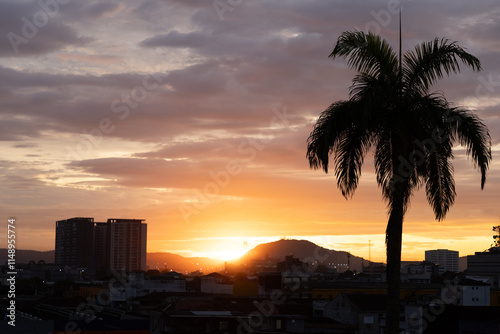 sunrise over a beach city