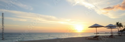 A stunning beach landscape with white sandy shores, crystal clear waters, lush palm trees, colorful umbrellas, and a vibrant sunset sky, palm trees, sand