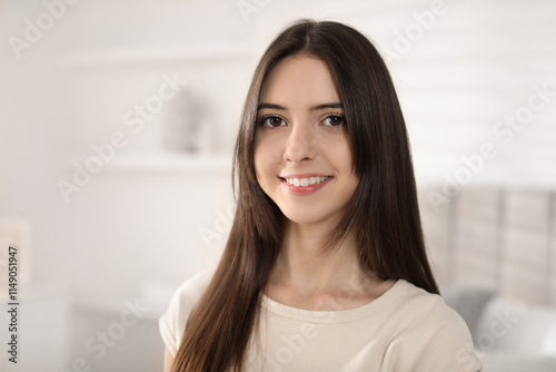 Portrait of happy teenage girl at home Free Download Portrait of happy teenage girl at home - GFXLoad
