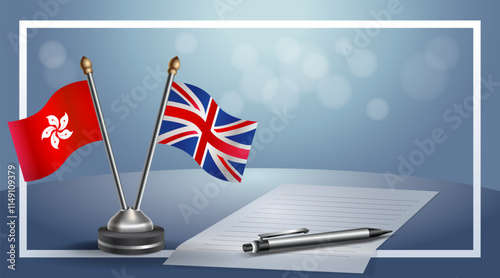 Hong Kong and United Kingdom National flags on small table with bokeh background, cooperative relationship
