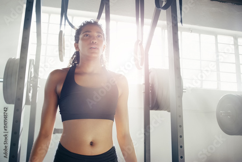 Tired, fitness and woman in gym with weights for intense training, exercise and bodybuilder workout. Sports, athlete and person breathe, sweat and fatigue for wellness, muscle and health in morning