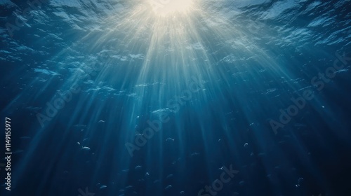 Underwater sunbeams illuminating ocean depths.