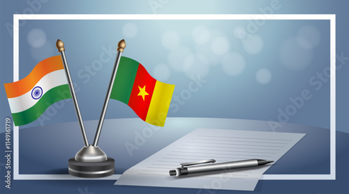 India and Cameroon National flags on small table with bokeh background, cooperative relationship