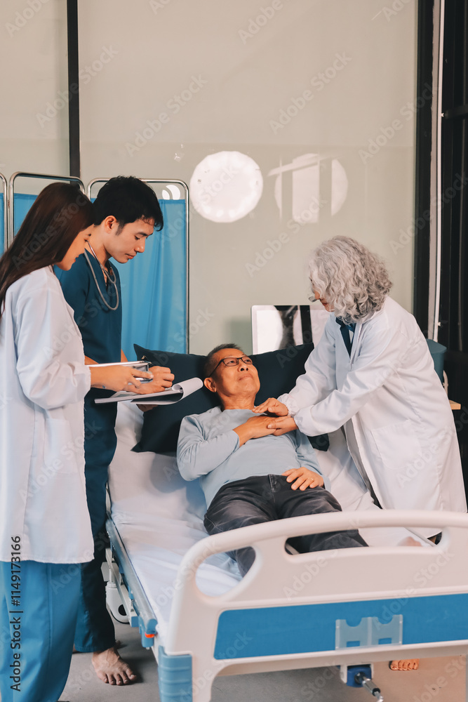 A team of doctors and nurses are working to treat a female patient in the patient's room. A team of doctors and nurses are working to treat a female patient in the patient's room.