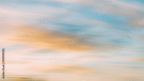 The sky and ocean appear out of focus, enhanced by a sweeping motion that adds a dynamic blur