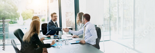 Agreement, meeting and business people with handshake in office, accounting firm and success for b2b deal. Boardroom, teamwork and accountants with shaking hands for welcome, greeting and thank you photo