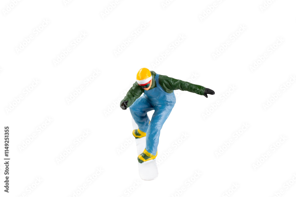 Miniature figurine depicting a snowboarder in mid-motion isolate on white background with clipping path Miniature figurine depicting a snowboarder in mid-motion isolate on white background with clipping path