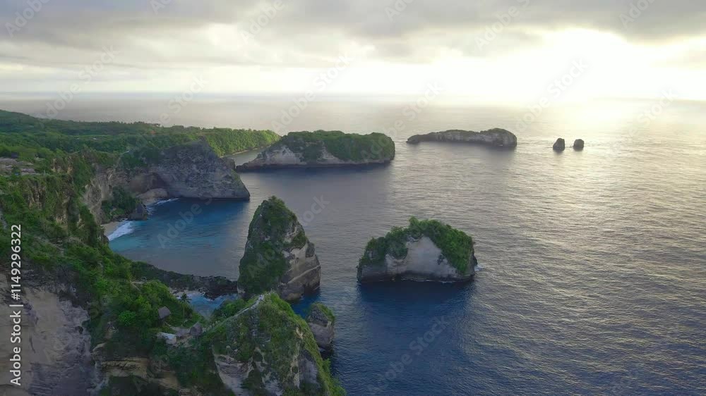 Amazing Ocean Rocks Formation with Blue Sea Water Suring Sunset Amazing Ocean Rocks Formation with Blue Sea Water Suring Sunset
