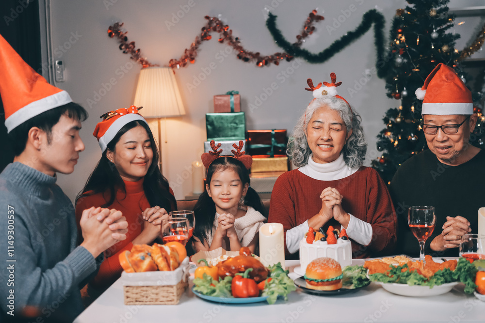 Happy multigeneration family enjoying in opening gifts on Christmas eve at home.