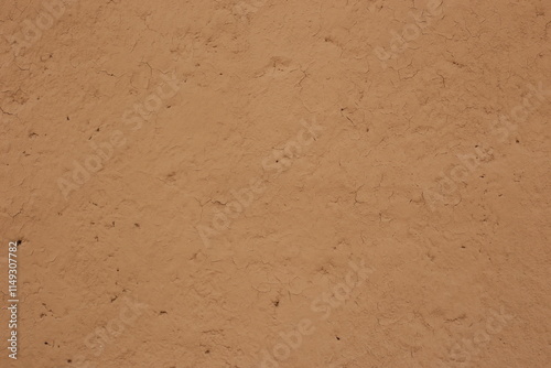 wall of home made from mud or adobe house. Clay wall texture of House structure.Selective focus photo