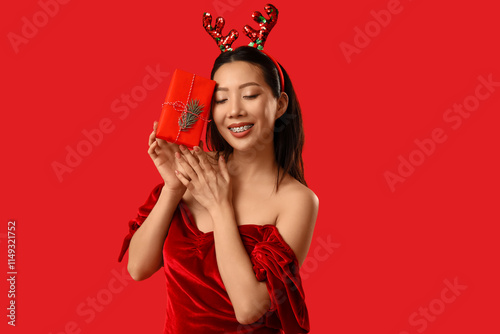 Young Asian woman in reinde...