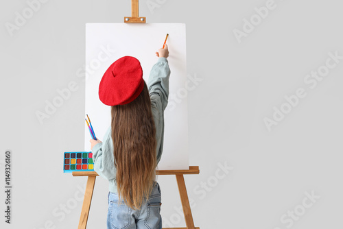 Cute little artist drawing ...