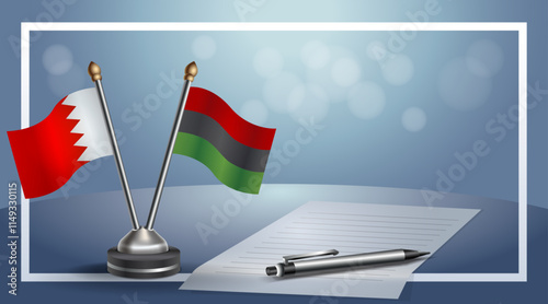 Bahrain and African American National flags on small table with bokeh background, cooperative relationship