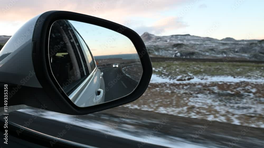 Inside car view of Icelandic landscapes and snow capped mountains in Iceland Inside car view of Icelandic landscapes and snow capped mountains in Iceland