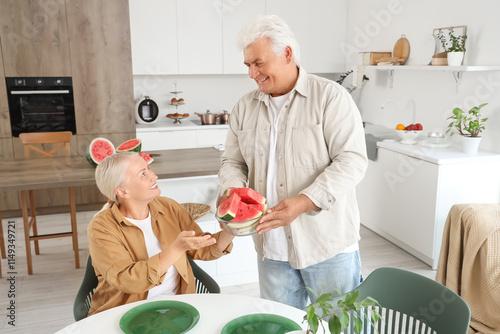 Mature woman taking slices ...