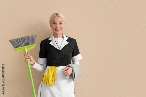 Middle-aged chambermaid wit...
