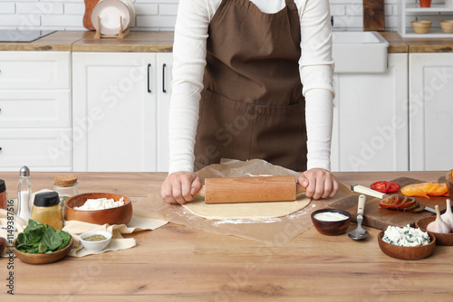 Woman preparing tasty tomat...