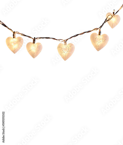 A string of glowing heart-shaped lights on a thin wire, emitting a warm, soft yellow glow. These decorative lights create a romantic and cozy ambiance.