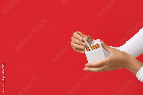 Female hands with pack of c...