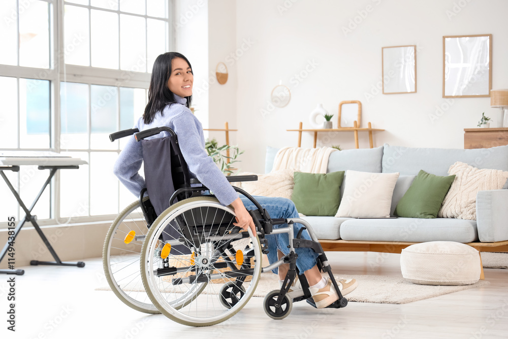 Beautiful young woman in wheelchair at home Beautiful young woman in wheelchair at home