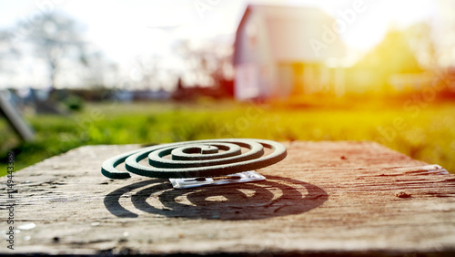 Insect and mosquito coil on a wooden table photo