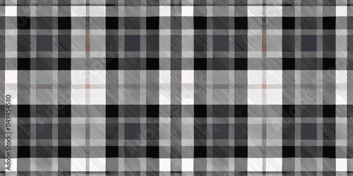 A stylish black and white plaid pattern, showcasing a modern textile design.