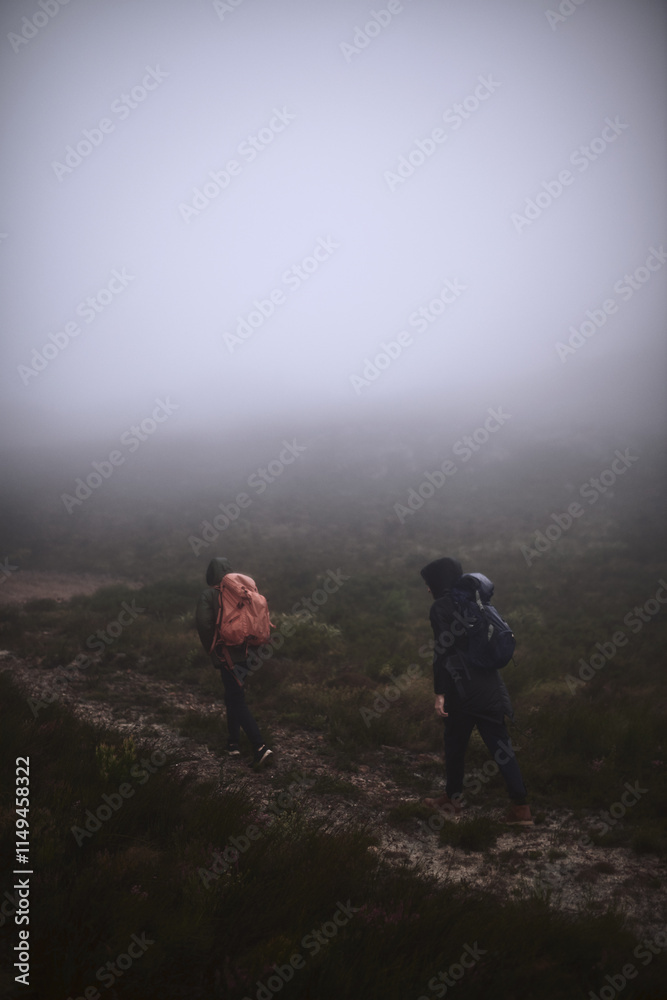 Obraz premium People, hiking and outdoor mountain for exercise, extreme terrain and nature for winter adventure. Back, friends and trekking journey on remote vacation, explore mockup space and together on trip
