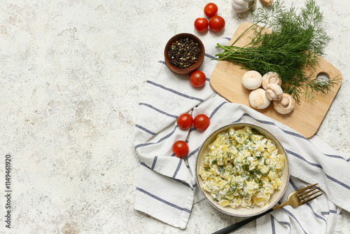 Bowl of tasty potato salad ...