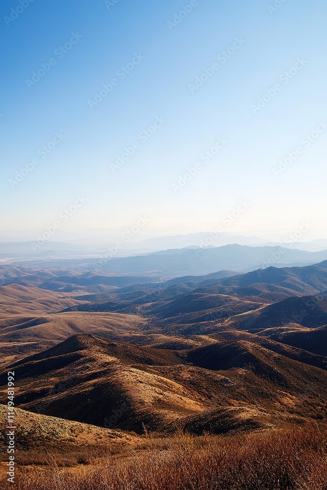Obraz premium vast empty mountain landscape with no distractions just rolling hills and clear skies perfect for designs requiring