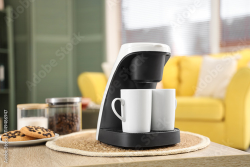 Coffee machine with cups on...