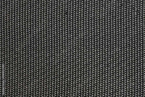 Texture of black fabric. Artificial dense fabric for backpacks bags and covers. Background, texture. photo