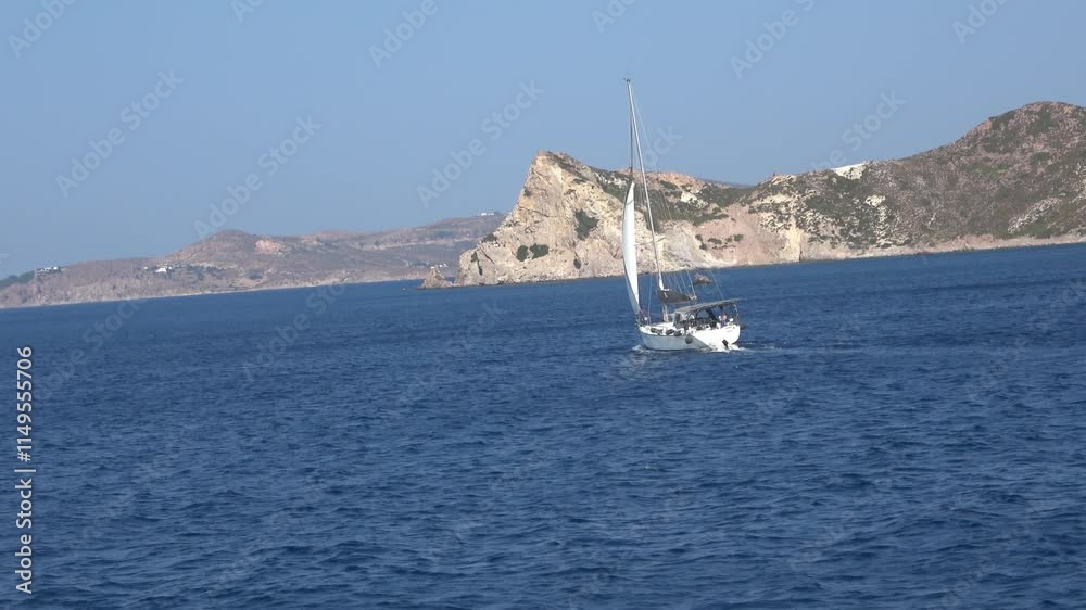 Fast tracking on a yacht while sailing. Fast tracking and focusing on a yacht while sailing with open sails Fast tracking on a yacht while sailing. Fast tracking and focusing on a yacht while sailing with open sails