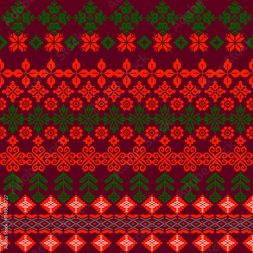 Colorful geometric pattern featuring red and green floral designs on a dark background, perfect for textiles or festive themes.