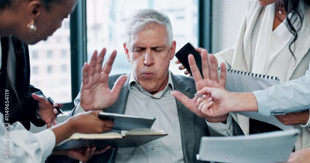 Busy, meeting and overwhelmed man with team workload, paperwork or phone call at digital agency. Stress, business people and mature consultant in office with anxiety, burnout or management crisis