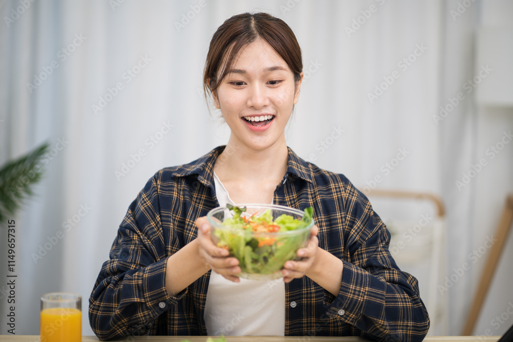 Asian woman dieting Weight loss eating fresh fresh homemade salad healthy eating concept Asian woman dieting Weight loss eating fresh fresh homemade salad healthy eating concept