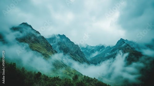 Wallpaper Mural Misty mountain range shrouded in fog, showcasing lush green valleys and peaks. Torontodigital.ca