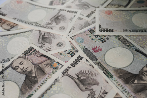 A collection of close-up photos of the Japanese 10,000 Yen banknote