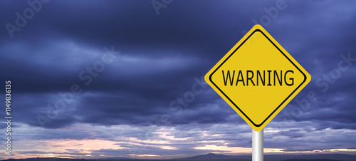 Hurricane Idalia warning sign against a powerful stormy background with copy space. Dirty and angled sign with cyclonic winds add to the drama.hurricane season sign on cloudy background photo