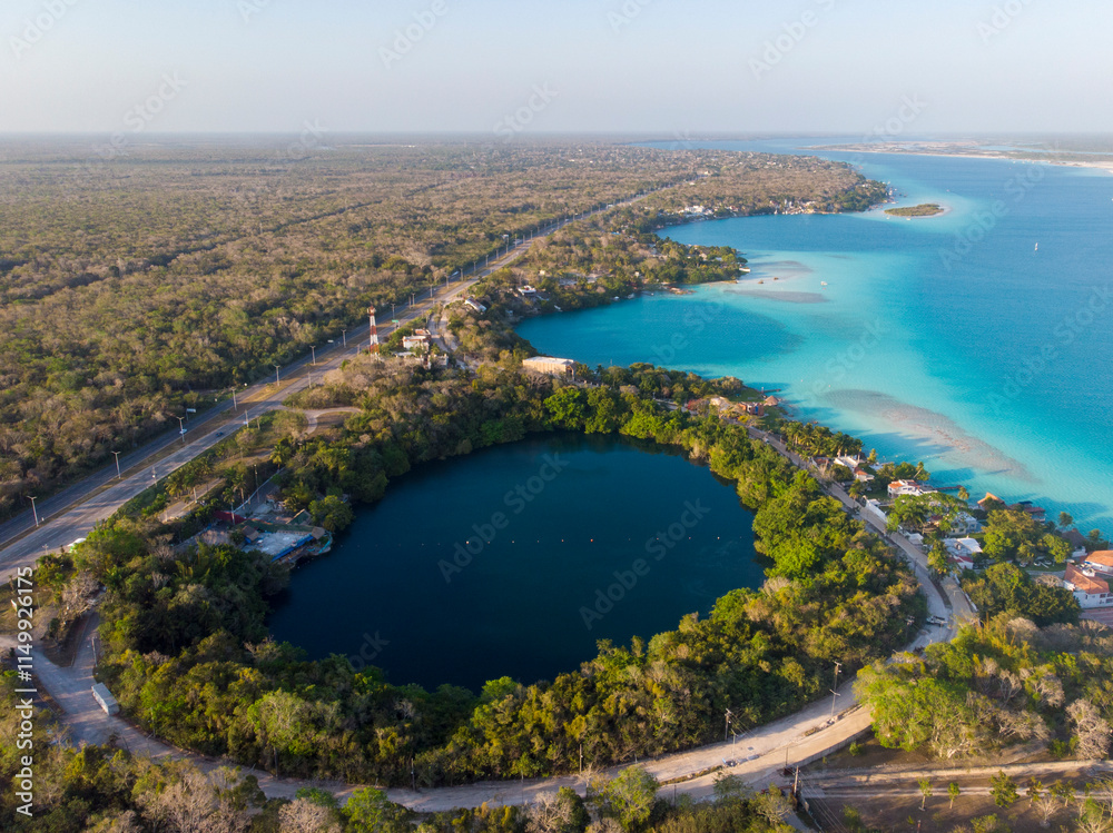 Aerial Drone Shot of Beautiful Cenote Azul and view on 7 seven colors lagoon in Bacalar, Quintana Roo, Mexico