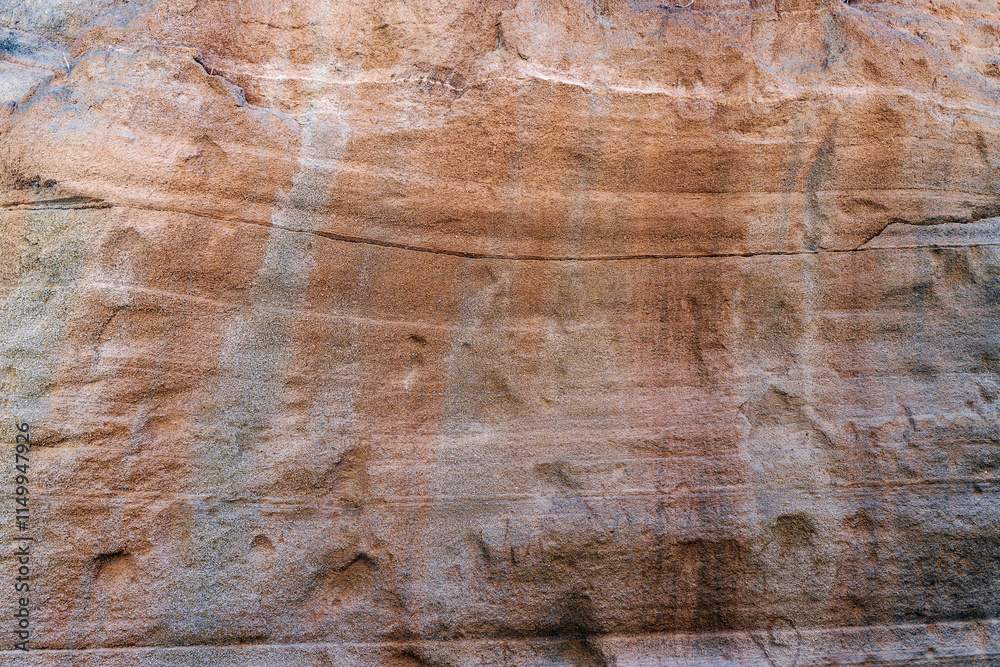 Naklejka premium A rough, textured surface with a lot of bumps and ridges