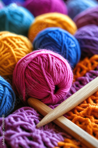 Crochet work with cotton yarn, yarn balls different colors, wood crochet needles. Handmade and crochet background 