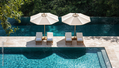 swimming pool in hotel. lounges and umbrellas at a luxurous hotel pool photo