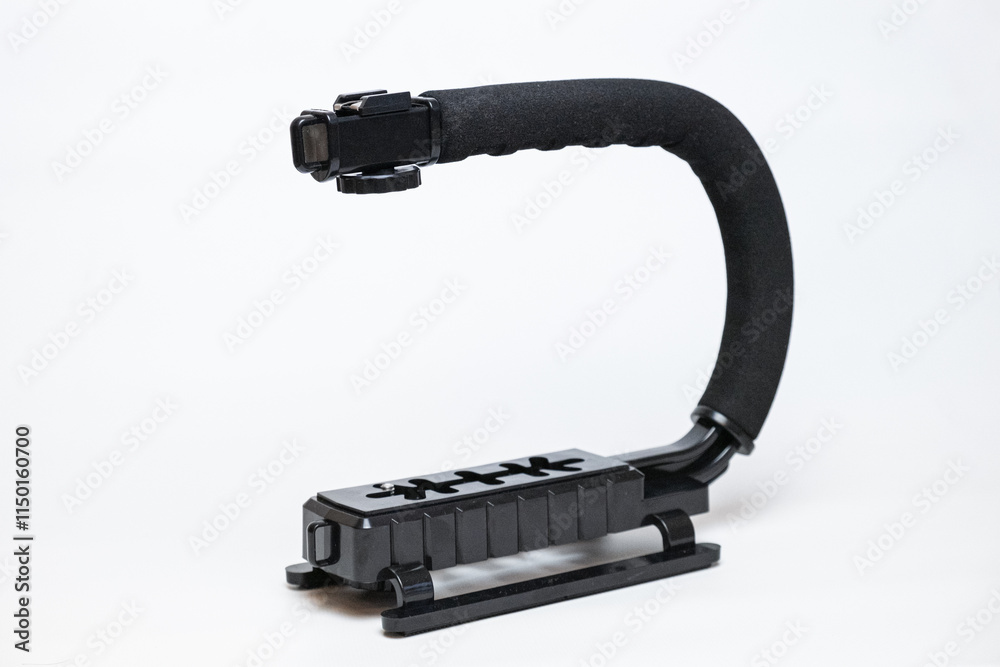 handheld black stabilizer for camera and smartphone, U C-shaped with a soft handle. A convenient and reliable tool for high-quality photography and video shooting handheld black stabilizer for camera and smartphone, U C-shaped with a soft handle. A convenient and reliable tool for high-quality photography and video shooting